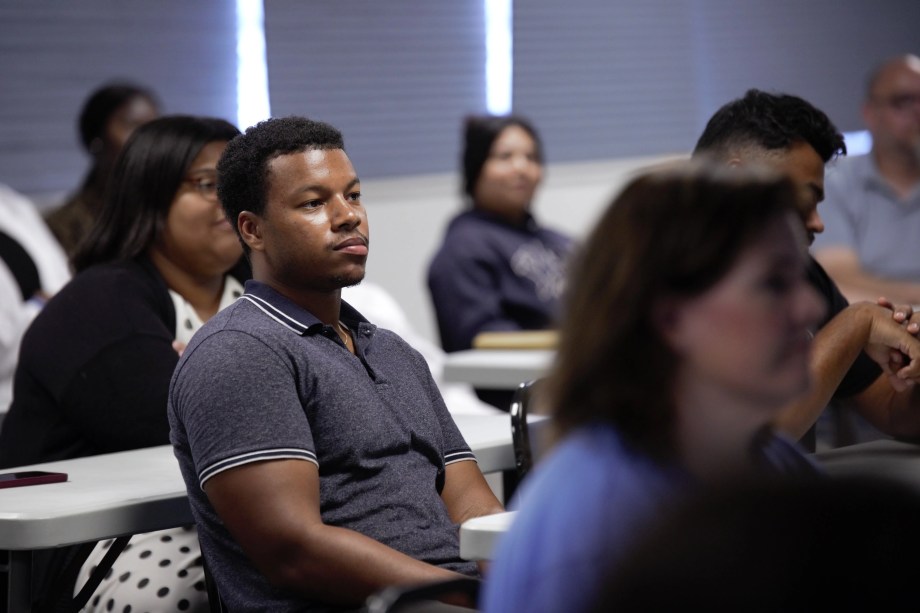 SMU Student listens closely during class lecture