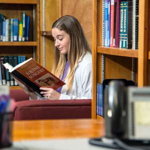SMU Veterinary student studying in library