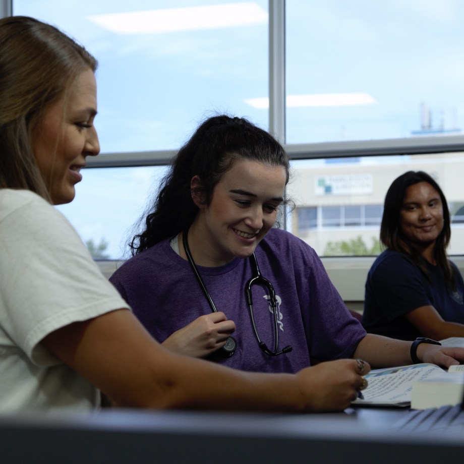 SMU Veterinary Students studying in library